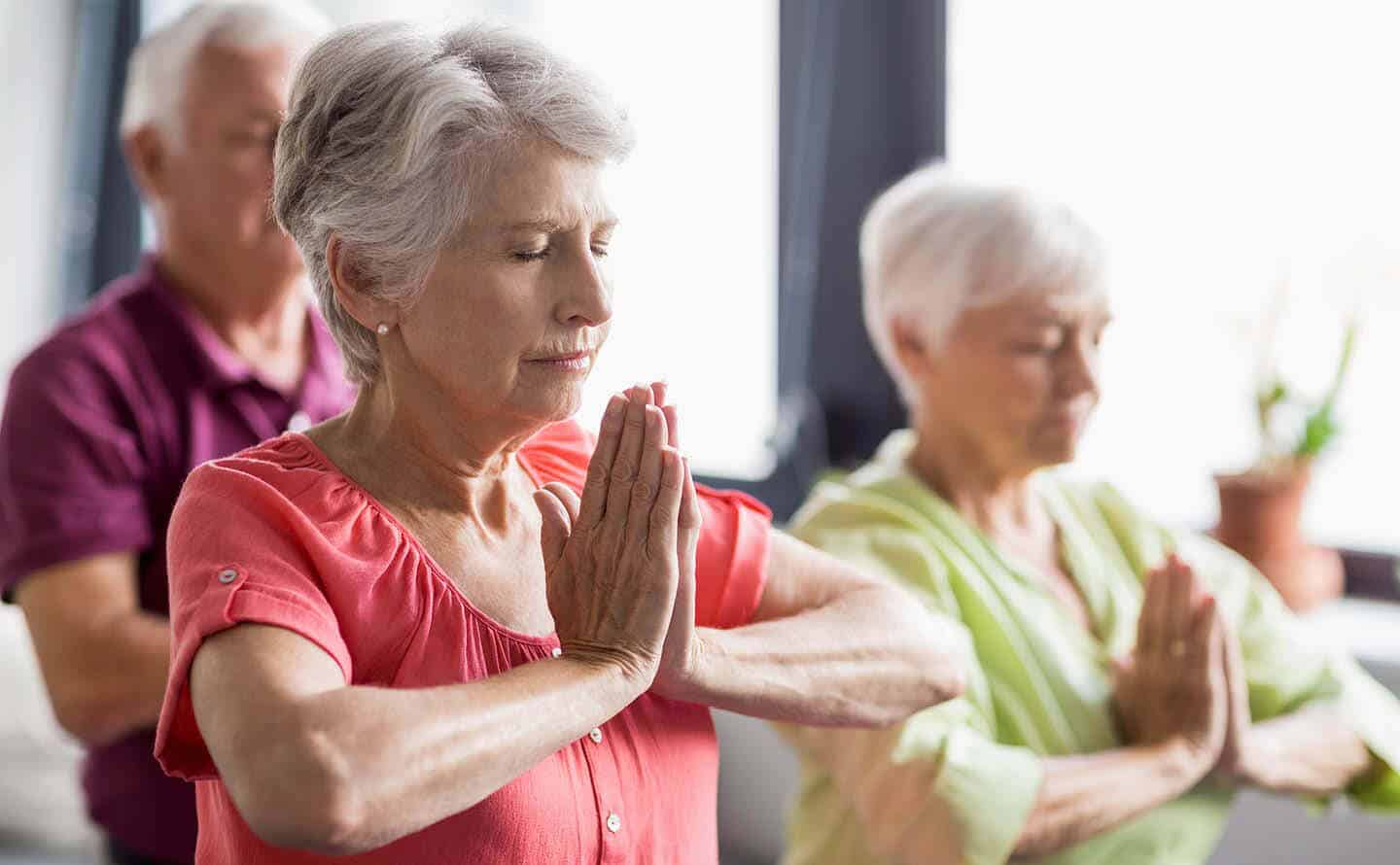 Seniors enjoying a yoga class