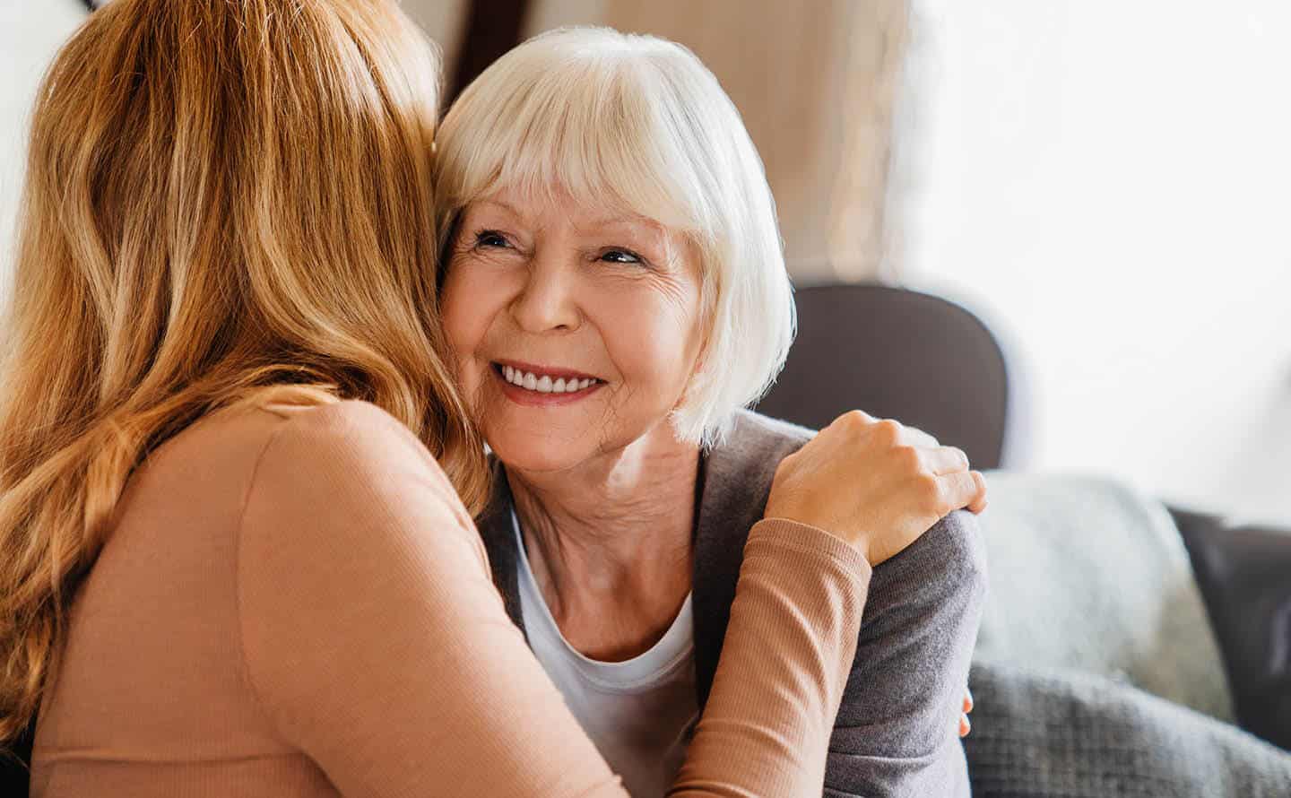 Senior mother and daughter embracing