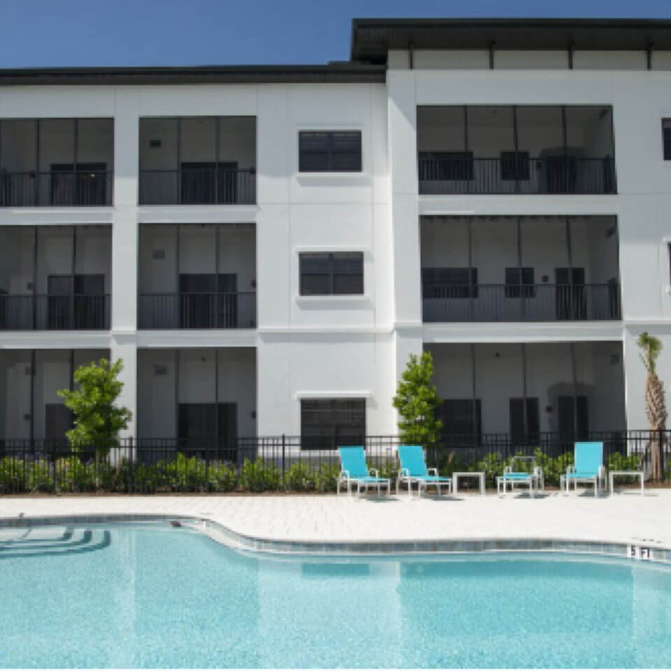Pool, lawn chairs and balconies at Highpoint at Cape Coral